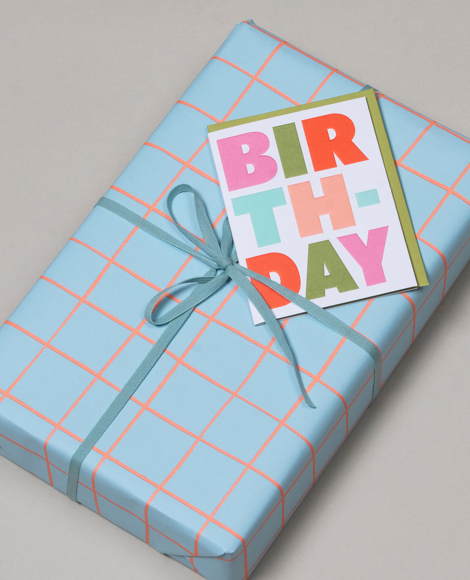 Criss Cross wrapping paper (pool blue, orange)